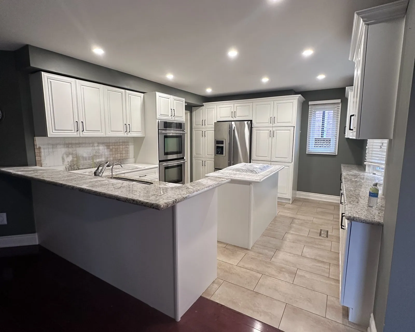 After — espresso sprayed cream, granite kept — Markham