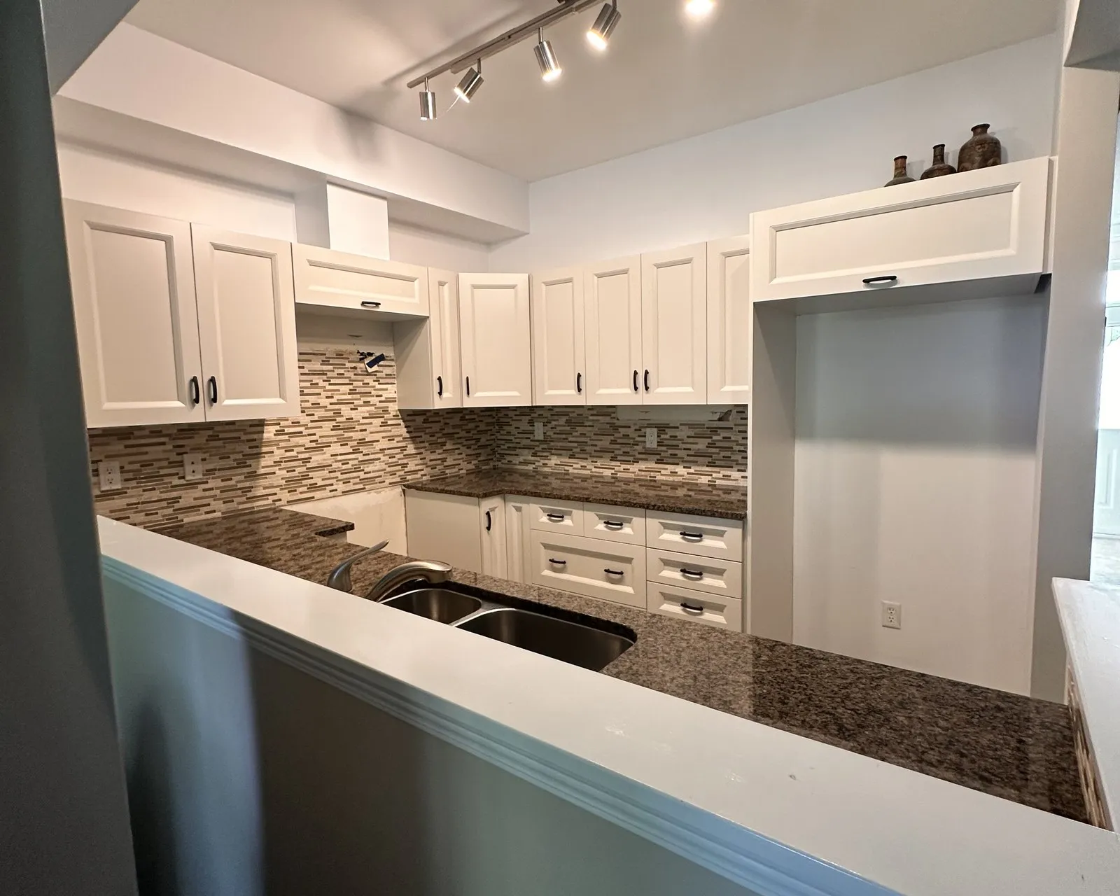 After — maple sprayed white, everything else kept — Richmond Hill