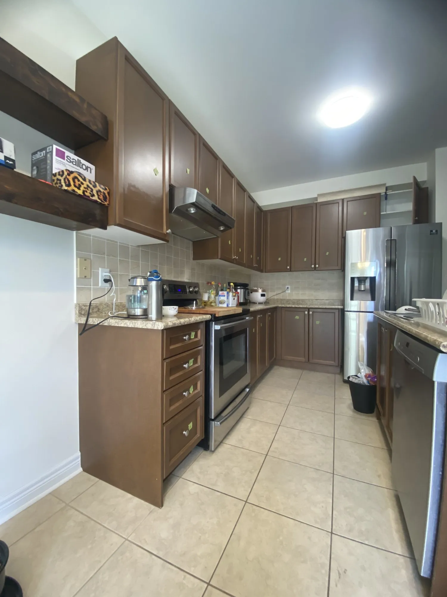 Before — walnut refinished white, crown moulding added, granite kept — Churchill Meadows, Mississauga