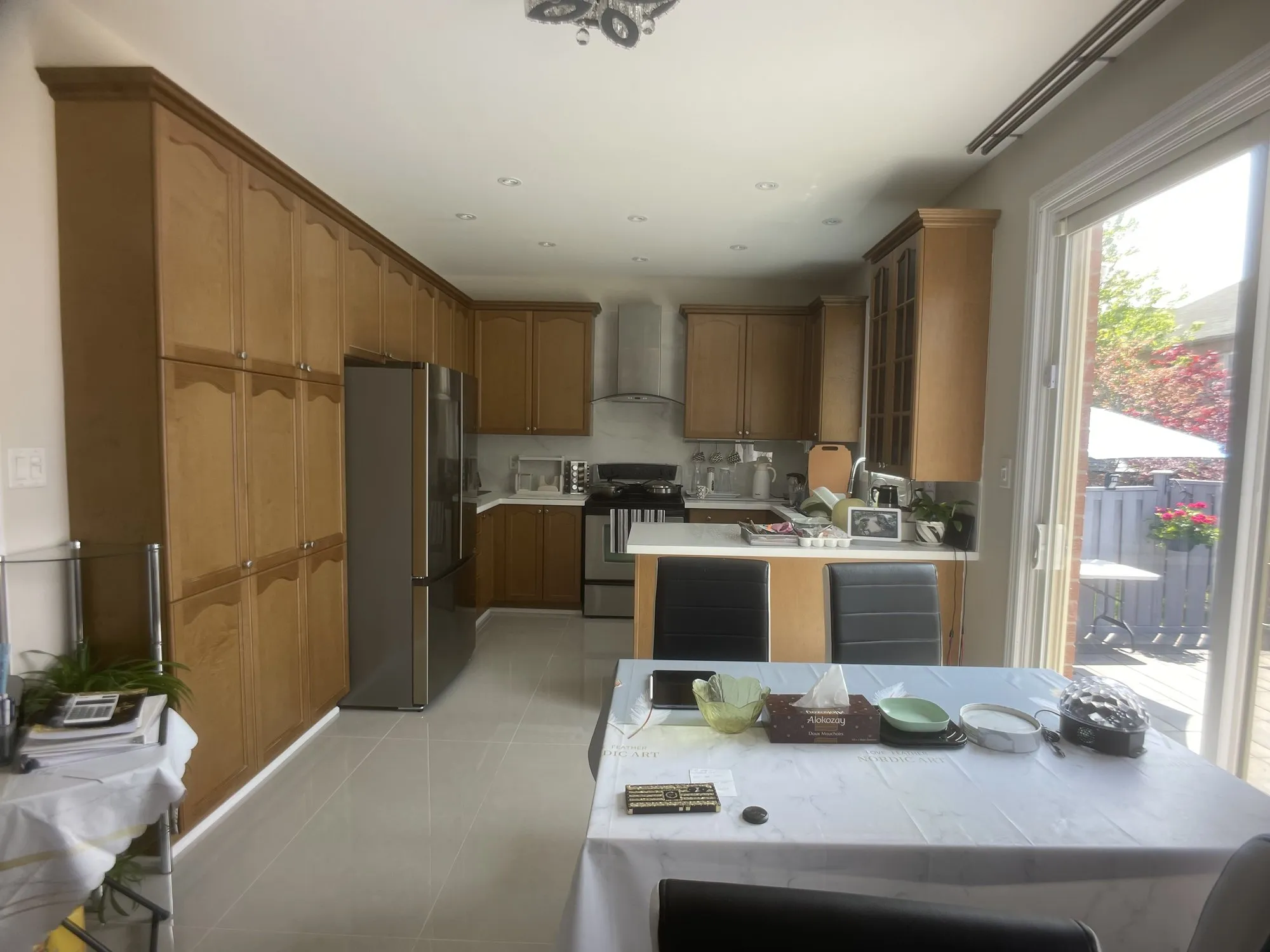 Before — honey oak refinished white, one line on the estimate and nothing else — Jefferson, Richmond Hill