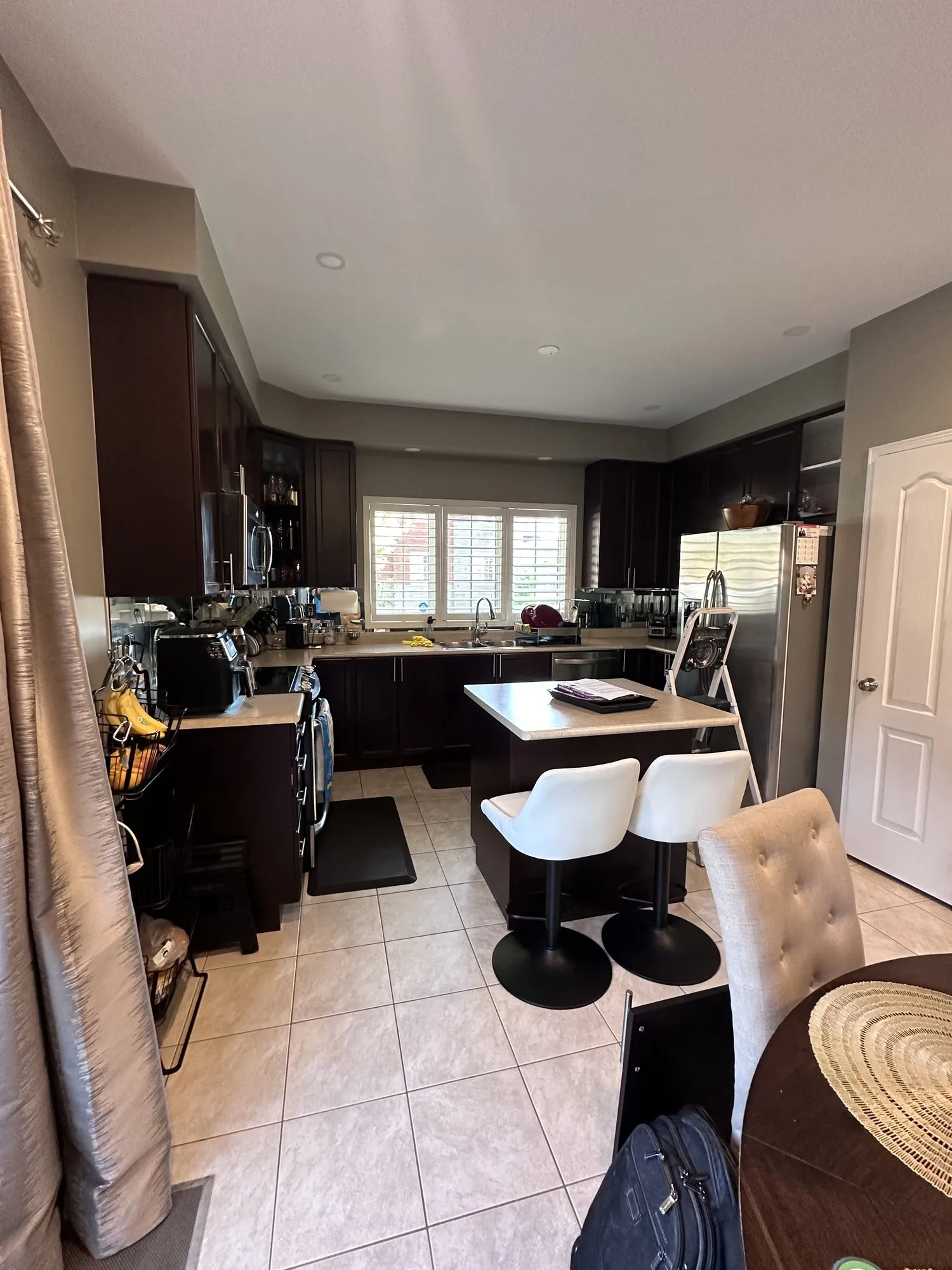 Before — espresso refinished white, island extended with a new cabinet and post in Northeast Ajax, Ajax