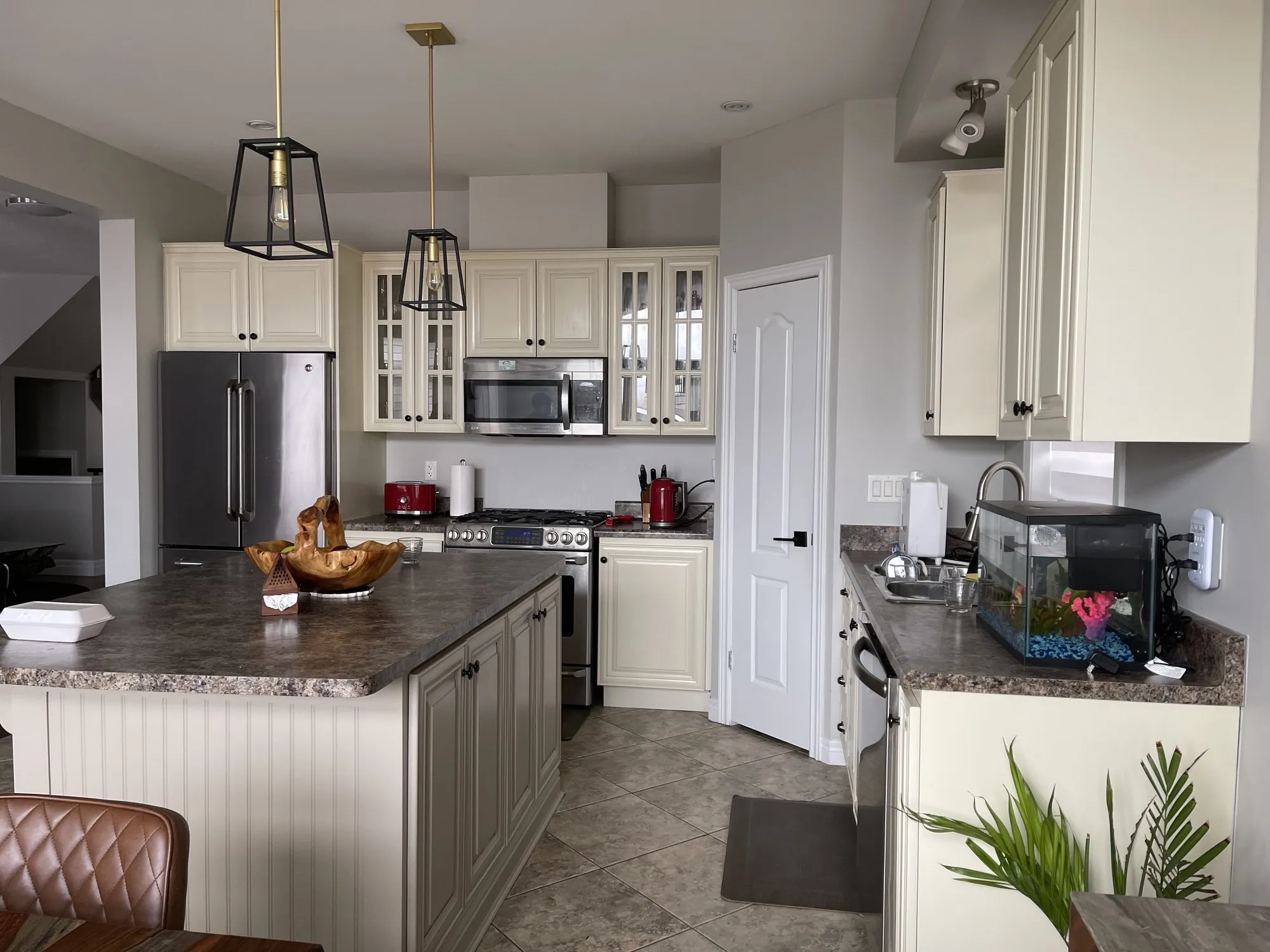 Before — cream cabinetry refinished white, counters and layout kept — Stoney Creek, Hamilton