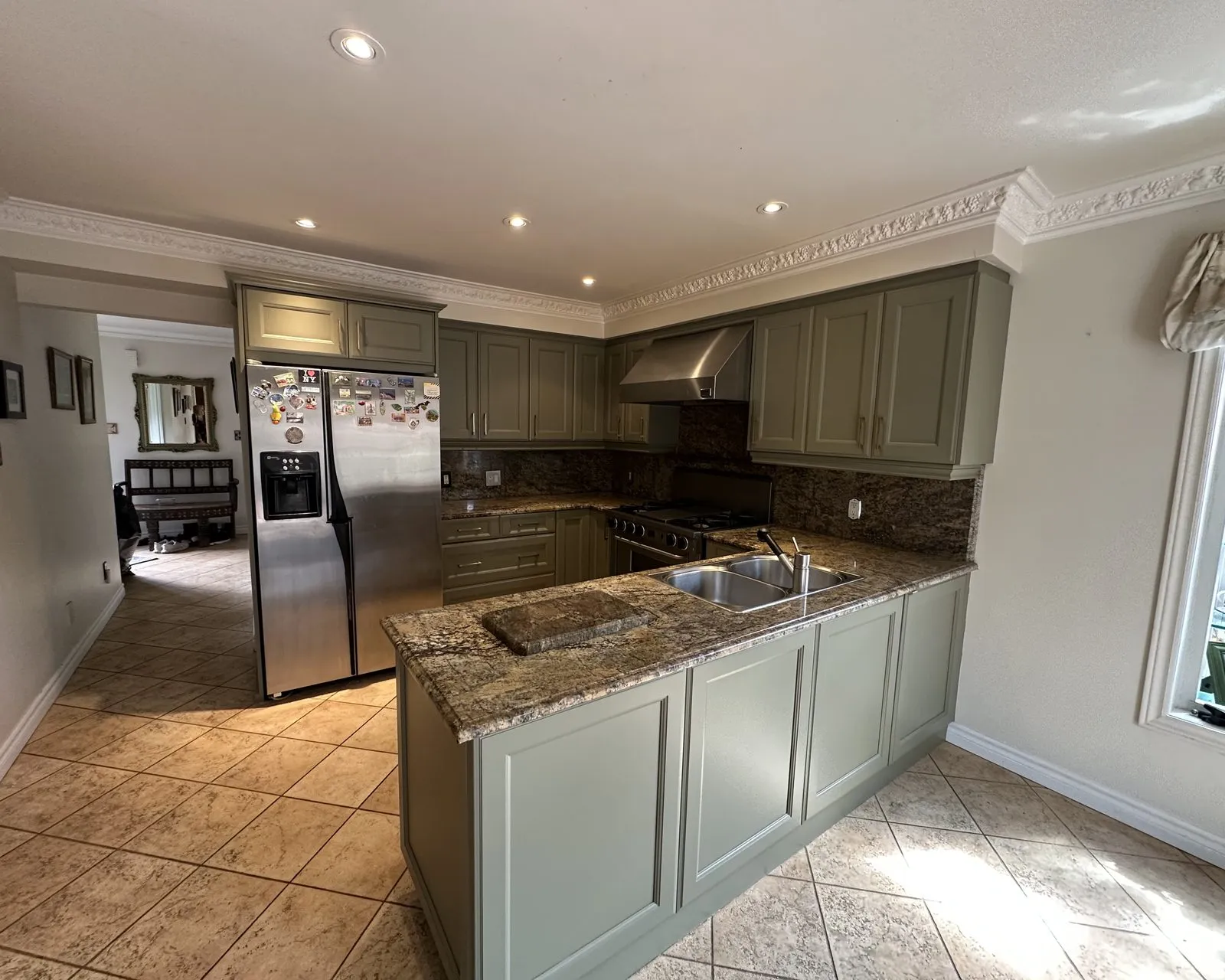 After — cream sprayed Tate Olive, new handles, granite kept — Maple, Vaughan