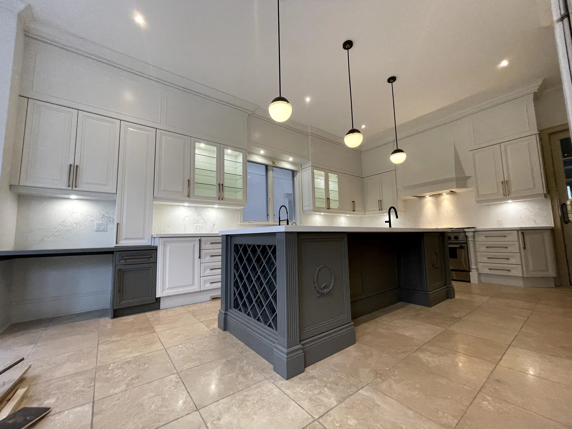 After — glazed cream and stained oak refinished in Simply White and Chelsea Grey — Bedford Park, North York
