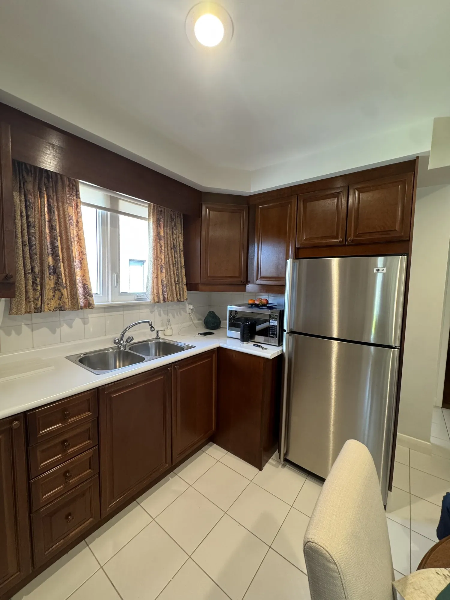 Before — dark walnut sprayed one grey tone, three cabinets rebuilt in Pelmo Park-Humberlea, Toronto