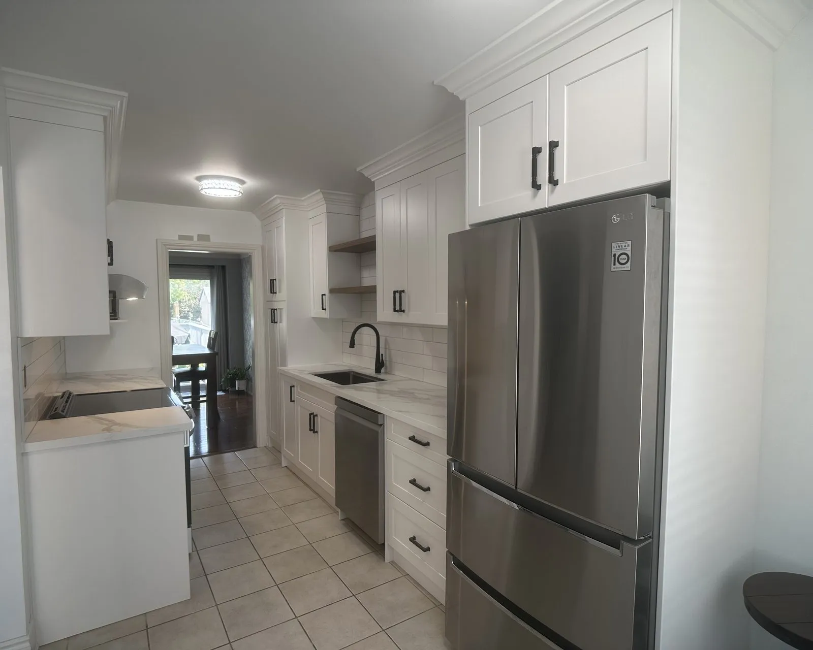 After — dated galley stripped out, new cabinetry built and installed — Ford, Oakville
